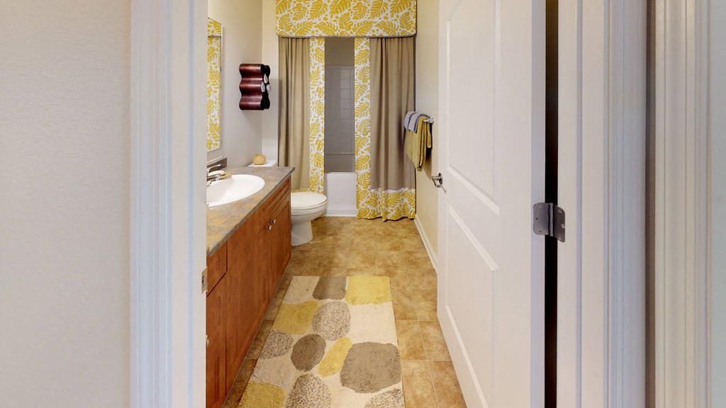 Bathroom with sink, toilet, shower and tub