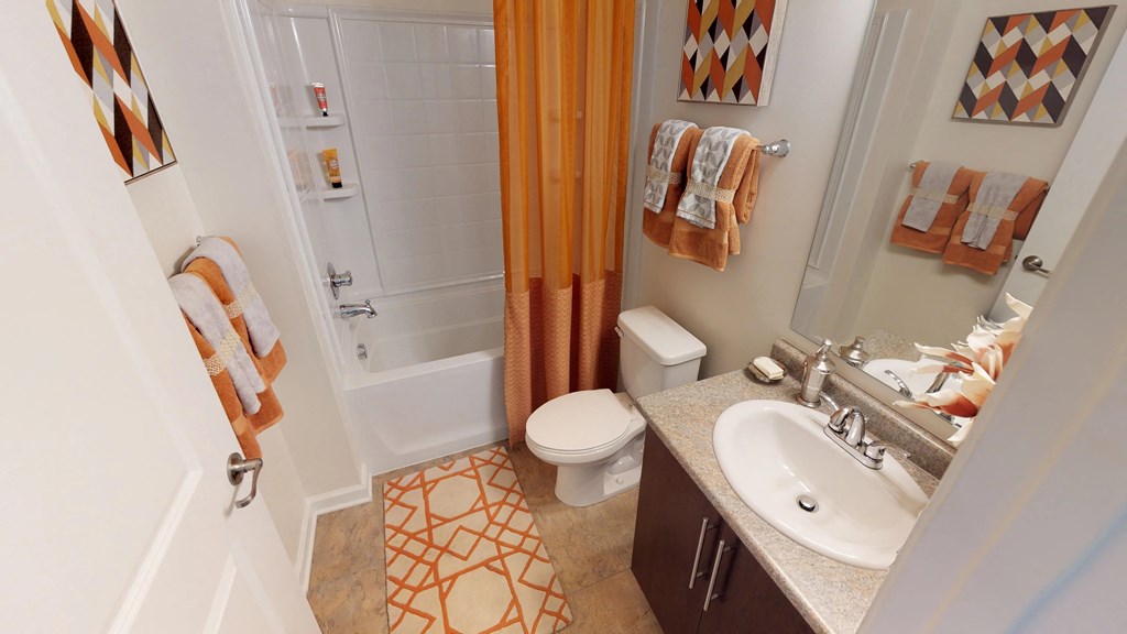 Bathroom with sink, toilet, shower and tub