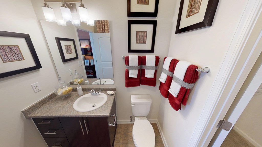 Bathroom with sink, toilet, shower and tub; walk-in closet
