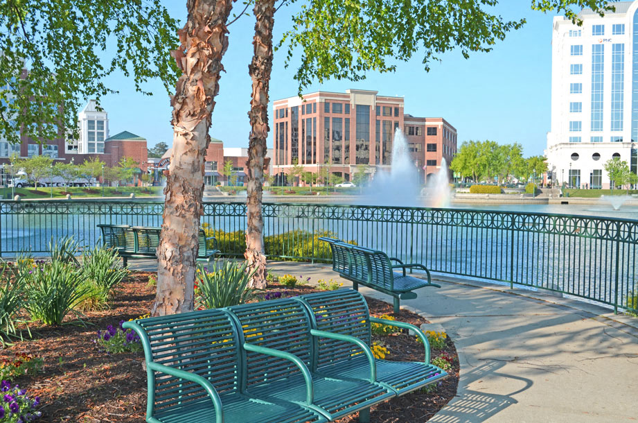 City Center benches overlooking fountain; office buildings and shops