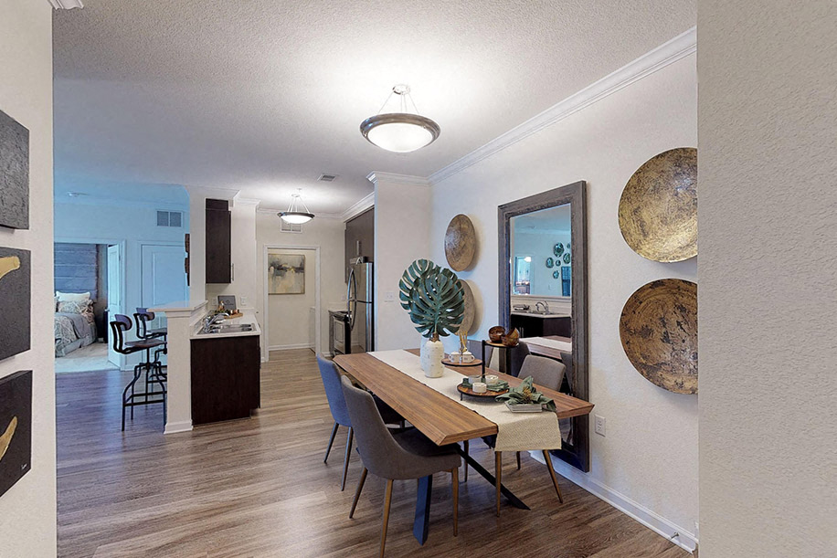 Entrway; dining area; galley kitchen with separate laundry room; open to living room