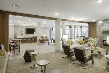 Clubhouse Clubhouse with kitchen, seating, fireplace and lounge areas