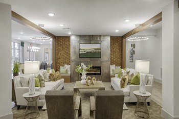 Clubhouse with seating and fireplace; flat screen TV - Photo Gallery 5