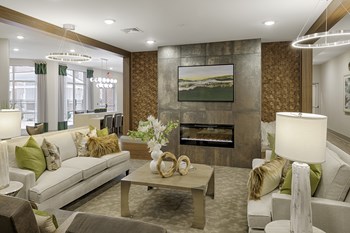 Clubhouse with seating and fireplace; flat screen TV - Photo Gallery 6