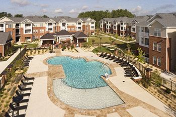 Resort-style pool with chaise lounges