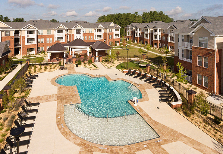 Pool with chairs and sun shelf