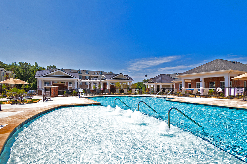 Pool with chairs and umbrellas