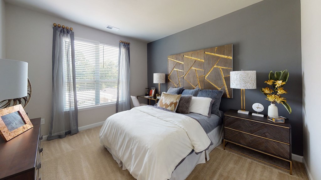 Bedroom with window; carpet