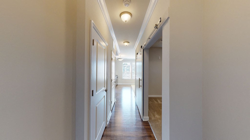 Hallway with bedroom on the right