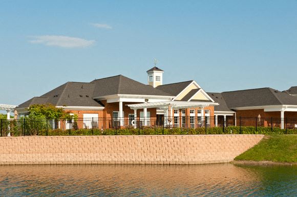 Belmont at Greenbrier Apartments Clubhouse overlooking pond