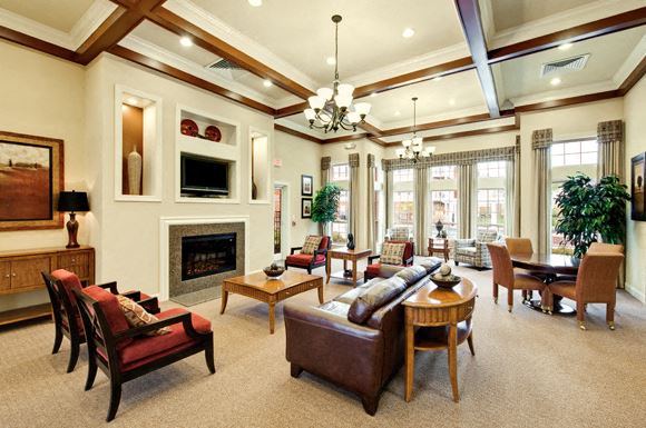 Clubhouse Clubhouse with chairs and fireplace