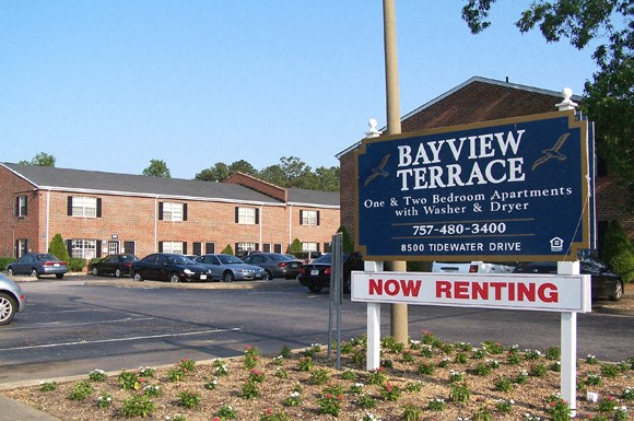 a sign on a parking lot