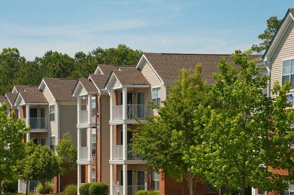Apartment building exterior; trees