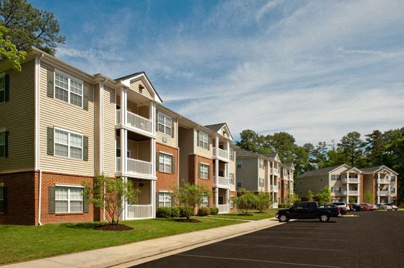 Apartment Exterior Apartment Buildings and Parking Lot
