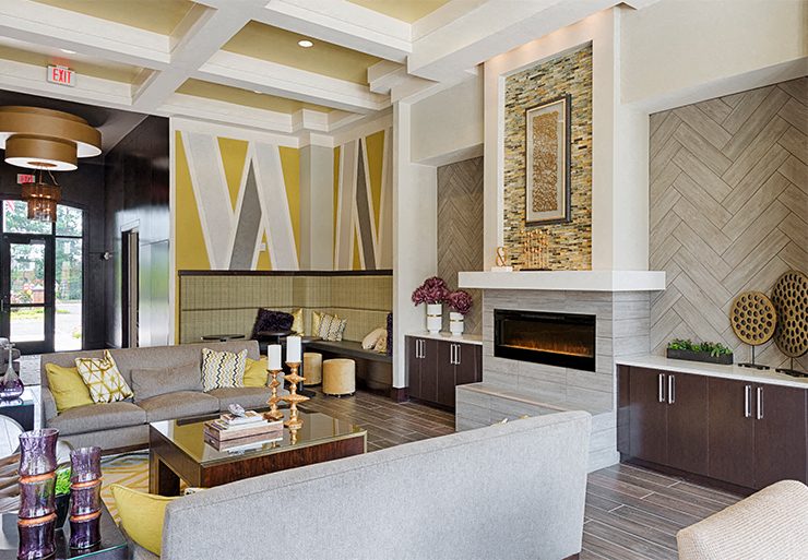 Clubhouse with seating and fireplace