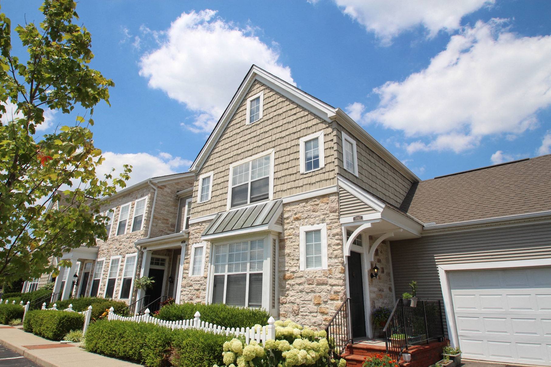 This is a picture of a townhome exterior at Nantucket Apartments, in Loveland, OH.