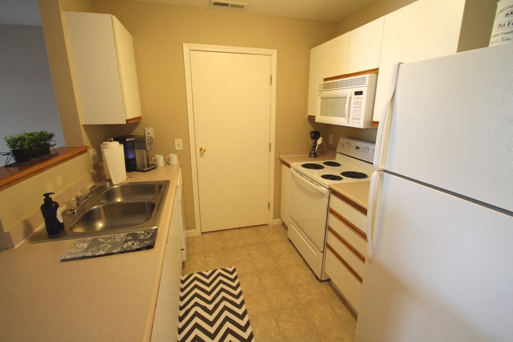 This is a photo of the kitchen in the 1110 square foot Freedom Patio at Washington Place Apartments in Washington Township, OH.