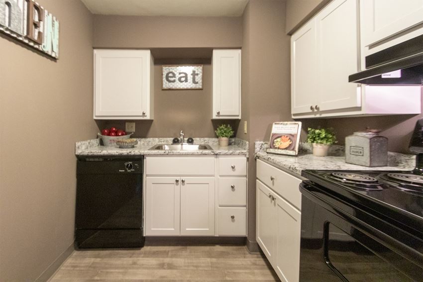 This is a picture of the kitchen in the 823 square foot 2 bedroom apartment at Aspen Village Apartments in Cincinnati, OH. - Photo Gallery 1