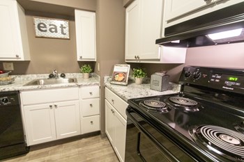 This is picture of the kitchen in the 823 square foot 2 bedroom apartment at Aspen Village Apartments in Cincinnati, OH. - Photo Gallery 3