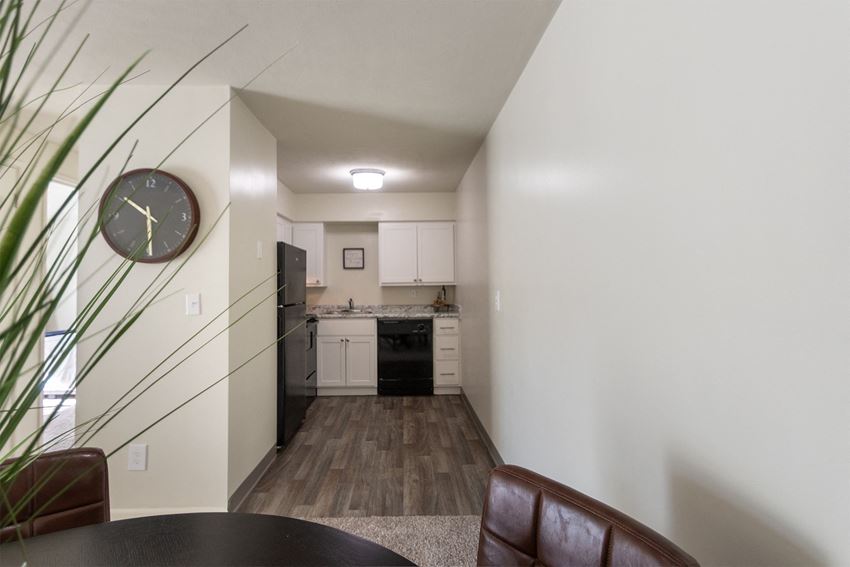 This is a photo of the kitchen from the dining area in a 560 square foot, 1 bedroom, 1 bath apartment at Aspen Village Apartments in Cincinnati, OH.