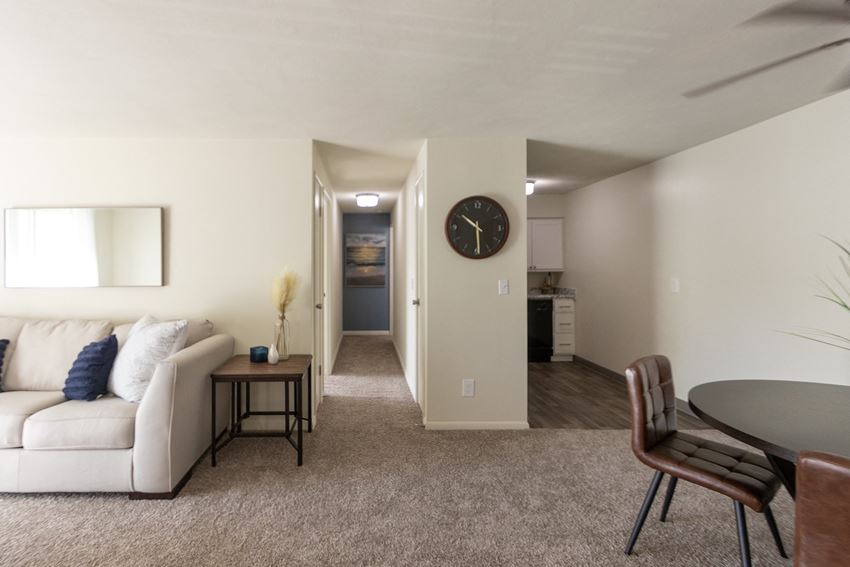 This is a photo of the hallway and kitchen area from the dining area in a 560 square foot, 1 bedroom, 1 bath apartment at Aspen Village Apartments in Cincinnati, OH.