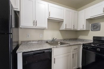 This is a photo of the kitchen in the 543 square foot B-style, 1 bedroom, 1 bath apartment at Blue Grass Manor Apartments in Erlanger, KY. - Photo Gallery 11