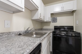 This is a photo of the kitchen in the 543 square foot B-style, 1 bedroom, 1 bath apartment at Blue Grass Manor Apartments in Erlanger, KY. - Photo Gallery 13