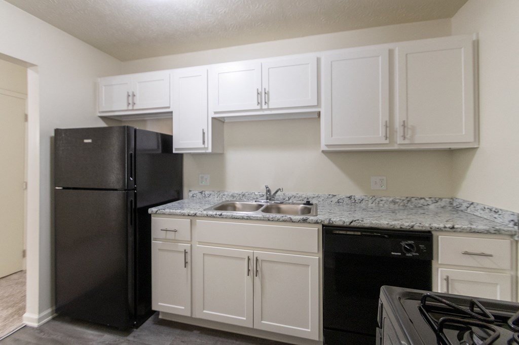 This is a photo of the kitchen in the 543 square foot A-style, 1 bedroom, 1 bath apartment at Blue Grass Manor Apartments in Erlanger, KY.