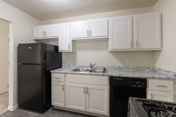This is a photo of the kitchen in the 543 square foot A-style, 1 bedroom, 1 bath apartment at Blue Grass Manor Apartments in Erlanger, KY. - Photo Gallery 9