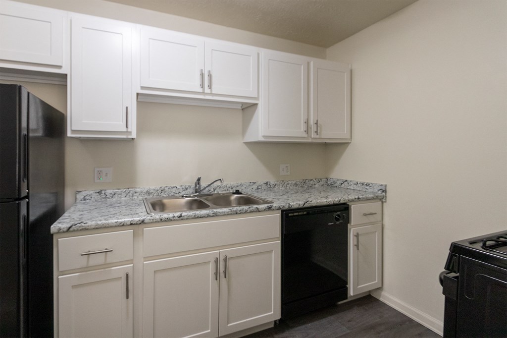 This is a photo of the kitchen in the 543 square foot A-style, 1 bedroom, 1 bath apartment at Blue Grass Manor Apartments in Erlanger, KY.
