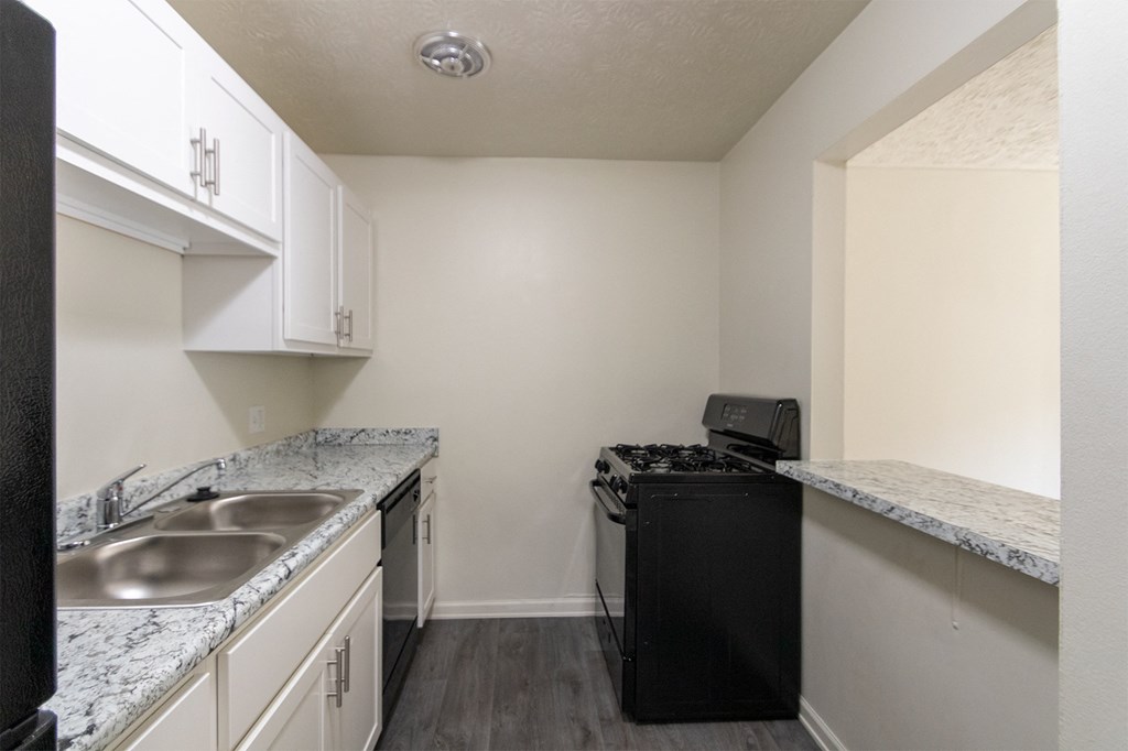 This is a photo of the kitchen in the 543 square foot A-style, 1 bedroom, 1 bath apartment at Blue Grass Manor Apartments in Erlanger, KY.