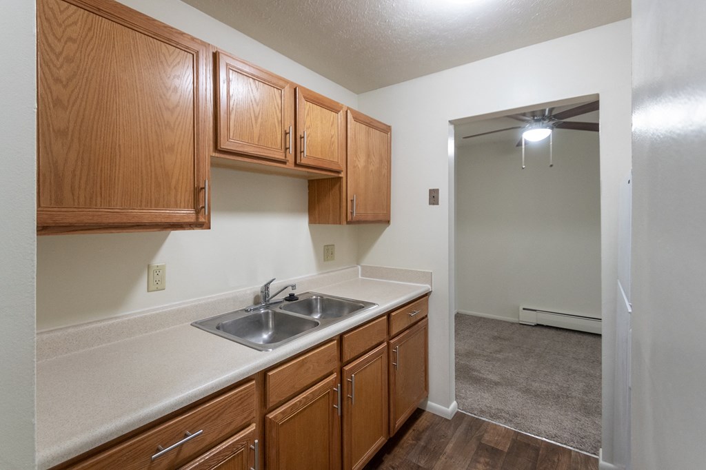 This is a photo of the kitchen in the 705 square foot, 1 bedroom, 1 bath apartment at Blue Grass Manor Apartments in Erlanger, KY.