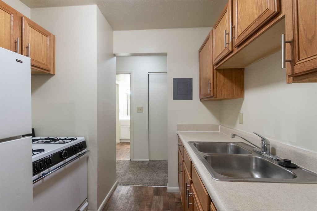 This is a photo of the kitchen in the 705 square foot, 1 bedroom, 1 bath apartment at Blue Grass Manor Apartments in Erlanger, KY.