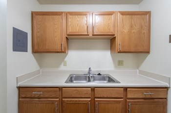 This is a photo of the kitchen in the 705 square foot, 1 bedroom, 1 bath apartment at Blue Grass Manor Apartments in Erlanger, KY. - Photo Gallery 16