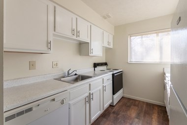 This is a photo of the kitchen in the 899 square foot, 2 bedroom, 1.5 bath apartment at Blue Grass Manor Apartments in Erlanger, KY.