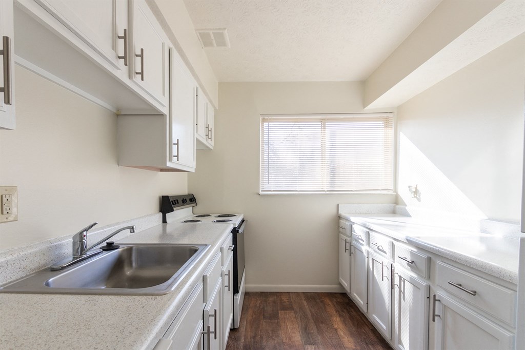 This is a photo of the kitchen in the 899 square foot, 2 bedroom, 1.5 bath apartment at Blue Grass Manor Apartments in Erlanger, KY.