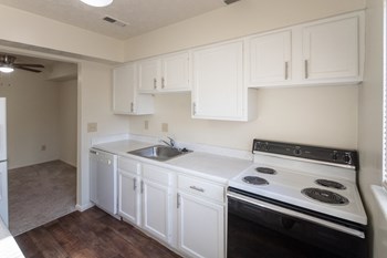 This is a photo of the kitchen in the 899 square foot, 2 bedroom, 1.5 bath apartment at Blue Grass Manor Apartments in Erlanger, KY. - Photo Gallery 4