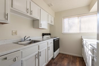 This is a photo of the kitchen in the 899 square foot, 2 bedroom, 1.5 bath apartment at Blue Grass Manor Apartments in Erlanger, KY. - Photo Gallery 35