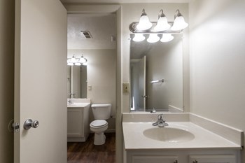This is a photo of the bathroom from the primary half bath in the 899 square foot, 2 bedroom, 1.5 bath apartment at Blue Grass Manor Apartments in Erlanger, KY. - Photo Gallery 39