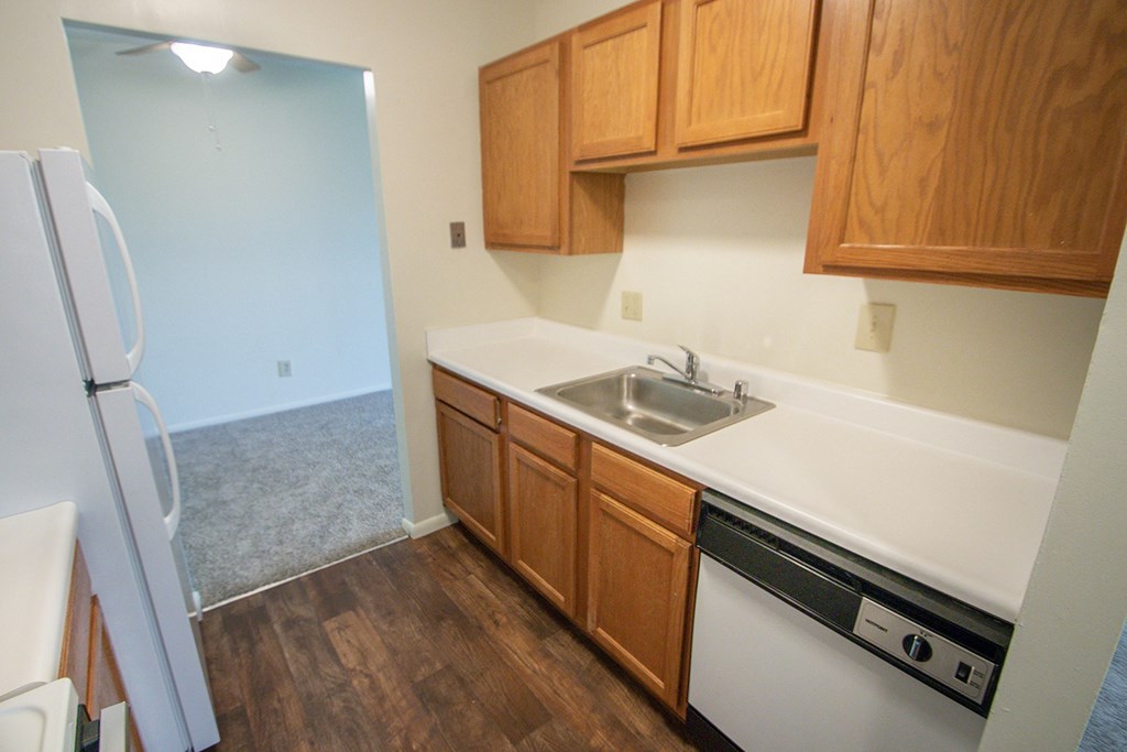 This is a photo of the kitchen in the 652 square foot, 1 bedroom, 1 bath A-style apartment at Blue Grass Manor Apartments in Erlanger, KY.