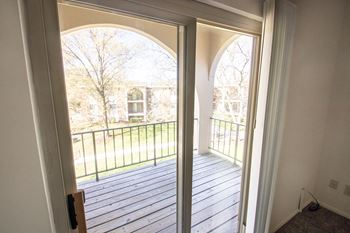 This is a photo of the balcony in the 652 square foot, 1 bedroom, 1 bath A-style apartment at Blue Grass Manor Apartments in Erlanger, KY.