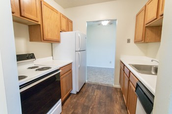 This is a photo of the kitchen in the 652 square foot, 1 bedroom, 1 bath A-style apartment at Blue Grass Manor Apartments in Erlanger, KY. - Photo Gallery 21