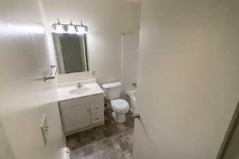 This is a photo of the full bathroom in the 865 square foot, 2 bedroom, 1 and a half bath apartment at Blue Grass Manor Apartments in Erlanger, KY. - Photo Gallery 53