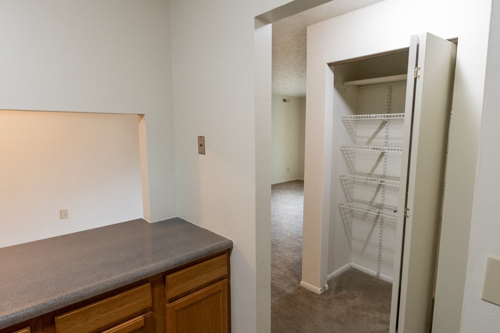 This is a photo of a hall closet in the 902 square foot, 2 bedroom, 1 and a half bath apartment at Blue Grass Manor Apartments in Erlanger, KY.