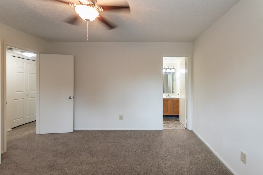 This is a photo of primary bedroom of the 902 square foot, 2 bedroom, 1 and a half bath apartment at Blue Grass Manor Apartments in Erlanger, KY.