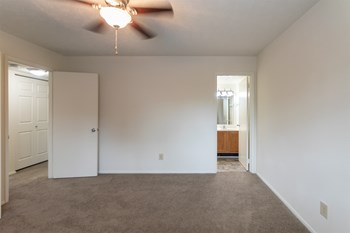 This is a photo of primary bedroom of the 902 square foot, 2 bedroom, 1 and a half bath apartment at Blue Grass Manor Apartments in Erlanger, KY. - Photo Gallery 45