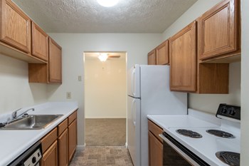 This is a photo of the kitchen in the 652 square foot, 1 bedroom, 1 bath B-style apartment at Blue Grass Manor Apartments in Erlanger, KY. - Photo Gallery 30