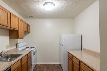 This is a photo of the kitchen in the 938 square foot , 2 bedroom, 2 bath apartment at Blue Grass Manor Apartments in Erlanger, KY. - Photo Gallery 28