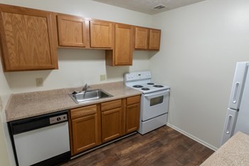 This is a photo of the kitchen in the 938 square foot , 2 bedroom, 2 bath apartment at Blue Grass Manor Apartments in Erlanger, KY. - Photo Gallery 27