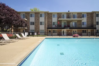 This is a photo of the pool area at Blue Grass Manor apartments in Erlanger KY. - Photo Gallery 32